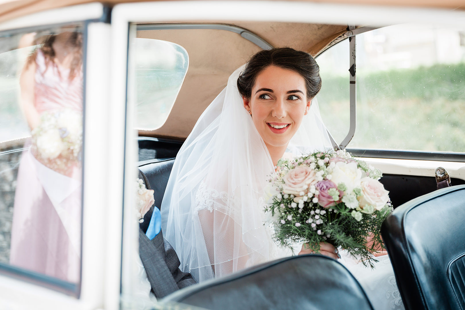 Devon Wedding Photographer Bride Car Veil Bouquet